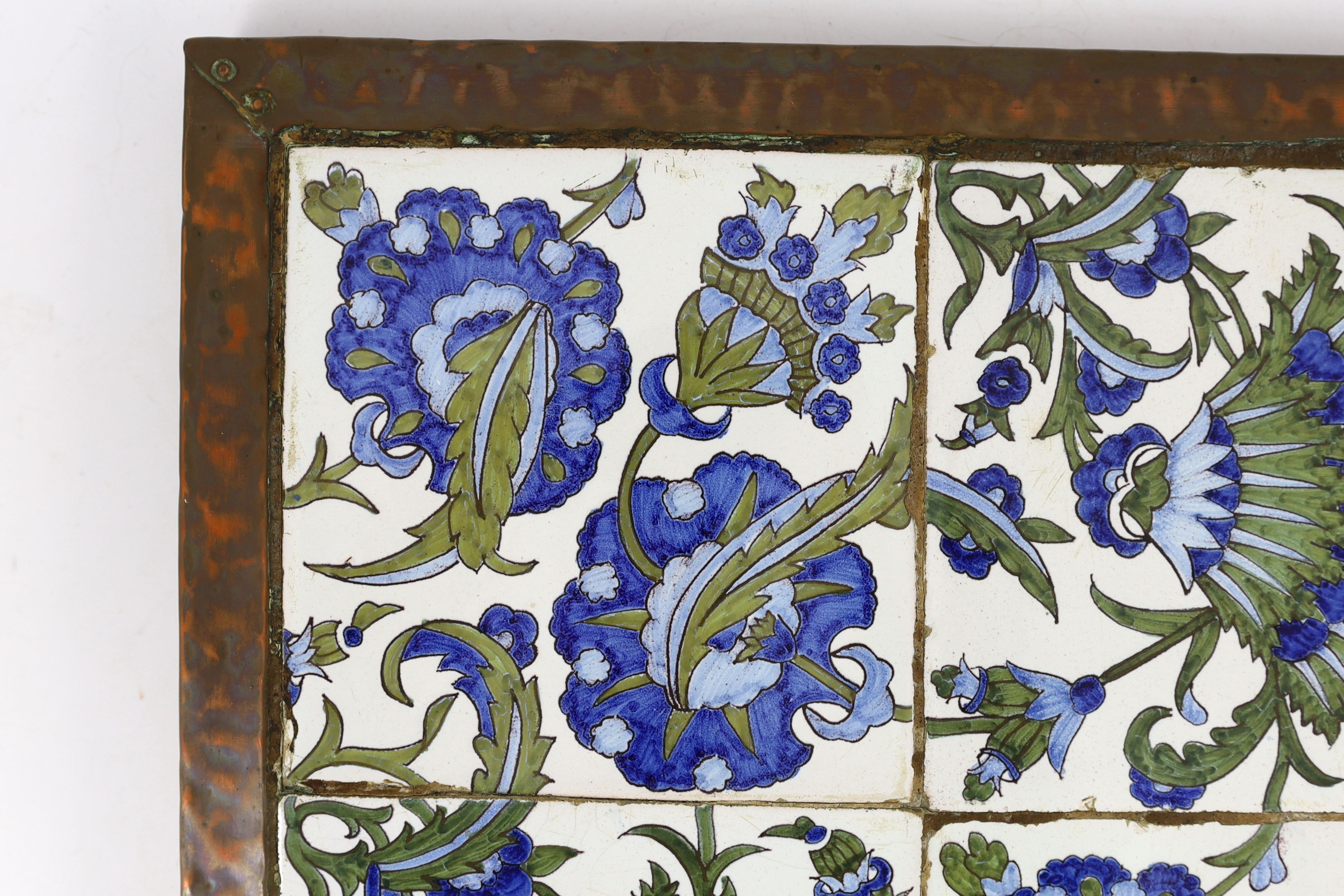 An Arts and Crafts de Morgan style 4 tile panel - 36 x 36cm
